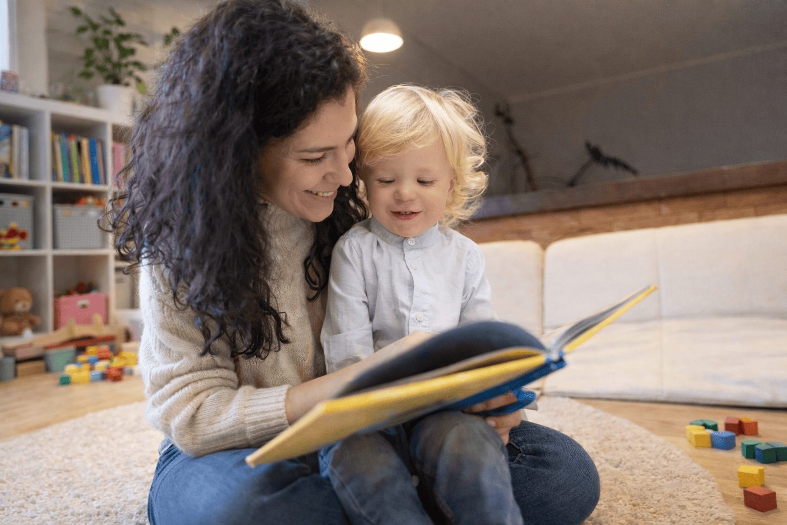 Early childhood educators and children in classroom learning